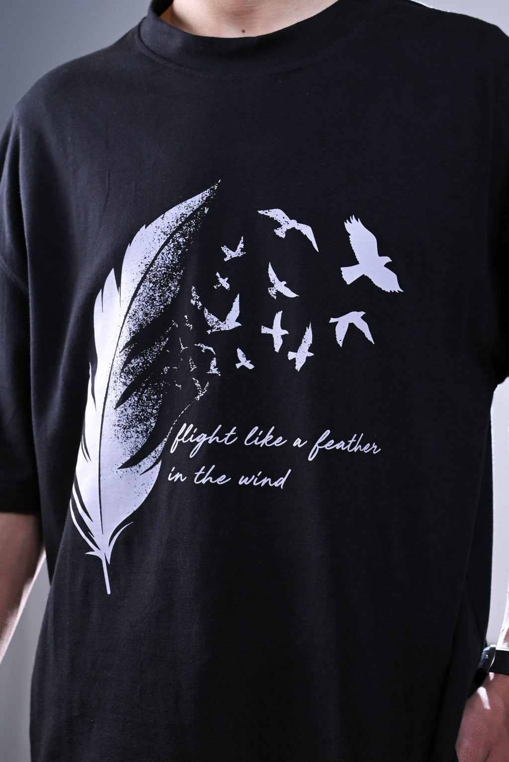 Feather Black Oversized Graphic T-Shirt! - sidewalk.pk